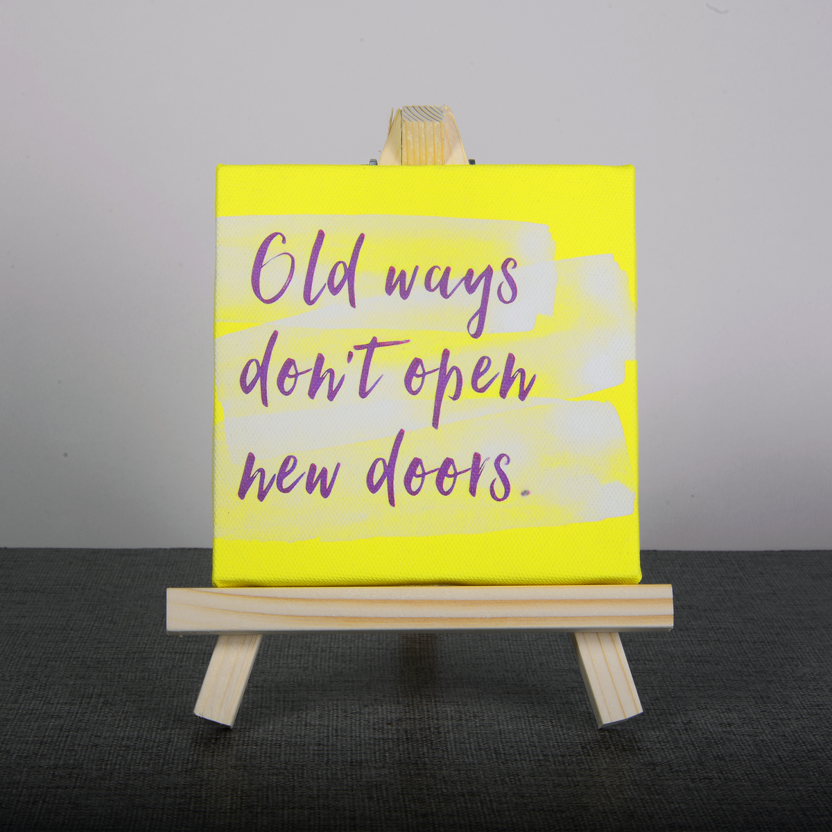 Easel Stand with Mini Canvas Motivational Quote “Old ways don't open new doors” for Office/Desk Decor/Home Decoration/Gift Purpose/Table Decorative Showpiece.